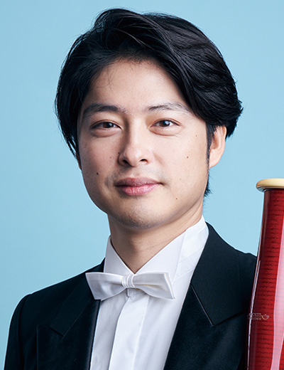 長哲也